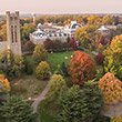An aerial photo of Clothier Bell Tower and Parrish Hall surrounded by fall foliage