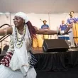 A dancer performs during the campaign kickoff event