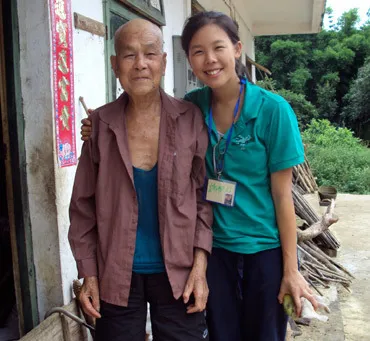 He Bo and Stephanie standing outside of He Bo's room