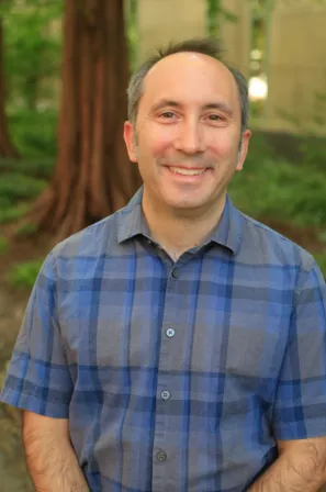 William Gardner in foreground, redwood tree in background