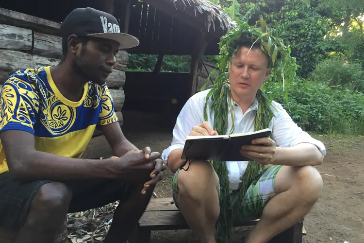 Harrison and local environmental expert Chris Nevehev on Aneityum Island