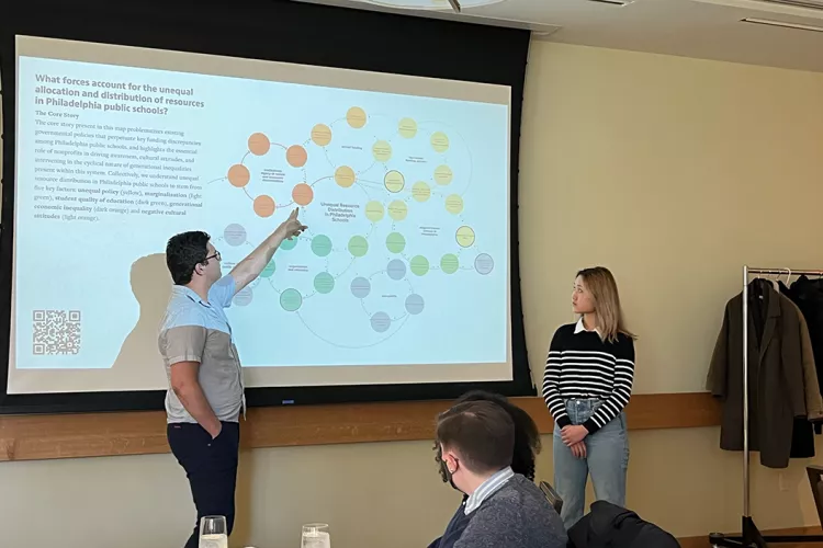 Student points to mapping visualization focused on unequal allocation of resources in Philadelphia