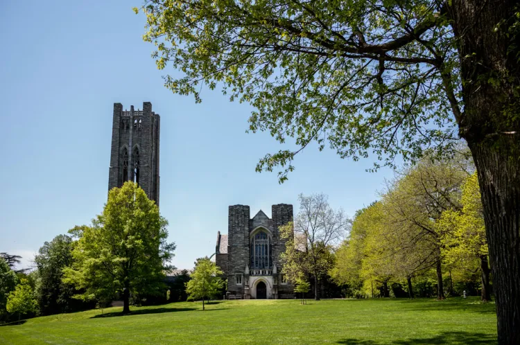 Green grass on Parrish Beach with Clothier bell tower in background