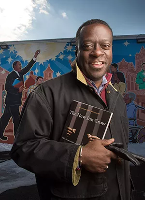 Keith Reeves with book