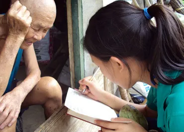 He Bo looks on as Stephanie writes him a message