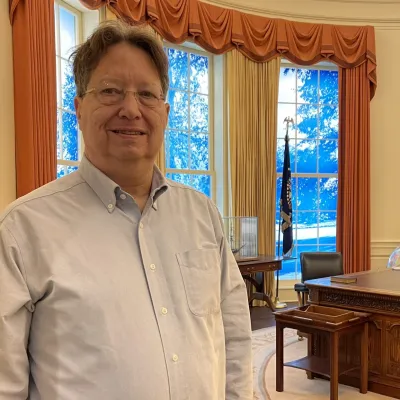 Roderick Wolfson inside a replica of the White House Oval Office as built within the Jimmy Carter Presidential Library and Museum