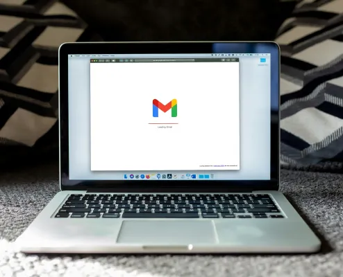 an open laptop with a loading screen of gmail