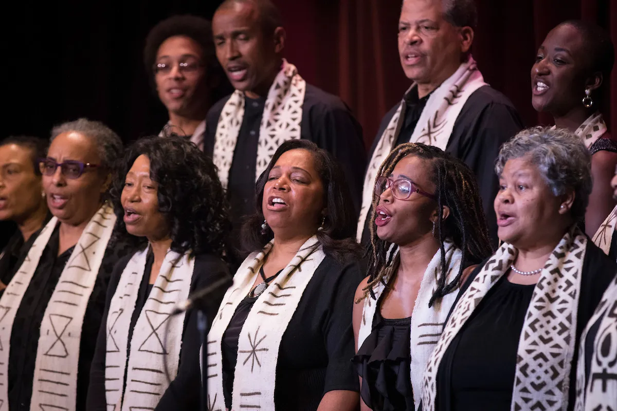 Two rows of singers during an Alumni Gospel Choir performance