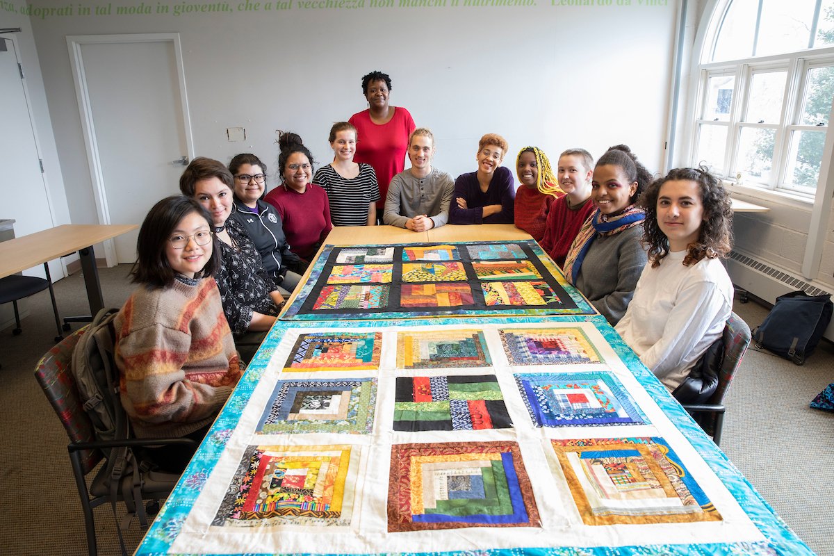 Students from the Black Art: Quilting as History and Culture, with their completed quilts.