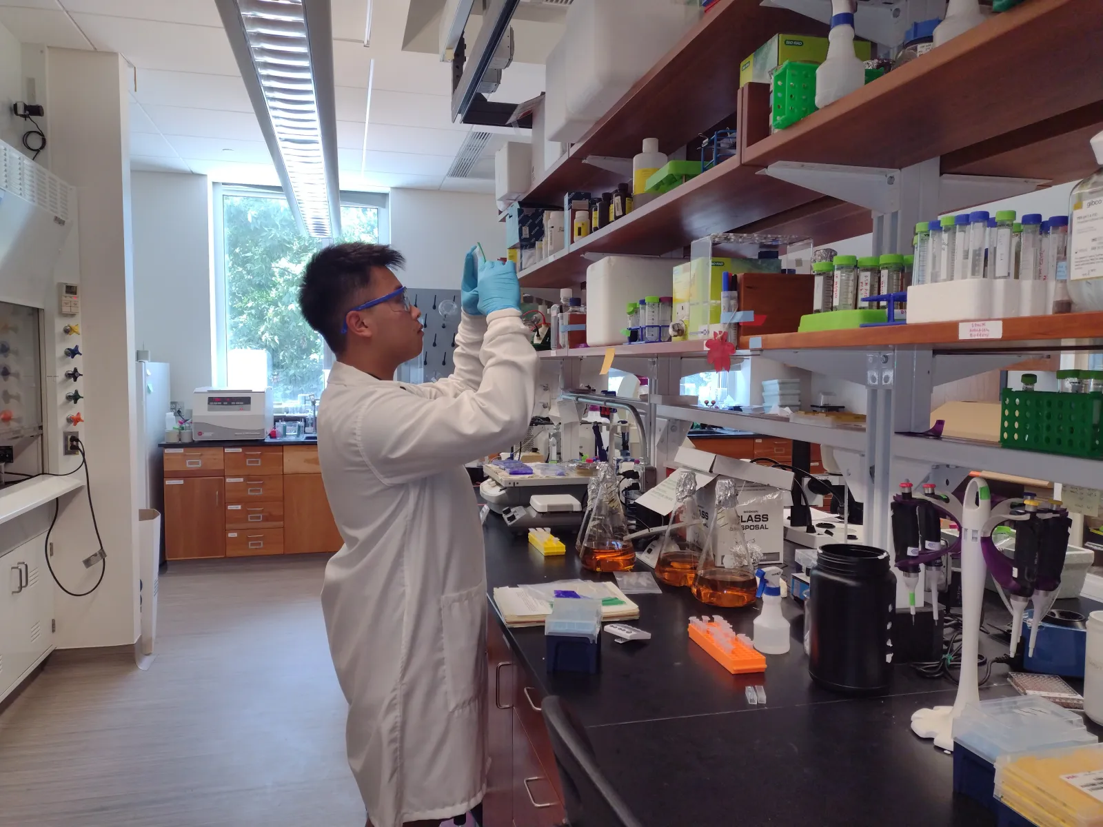 Student conducting research in lab.