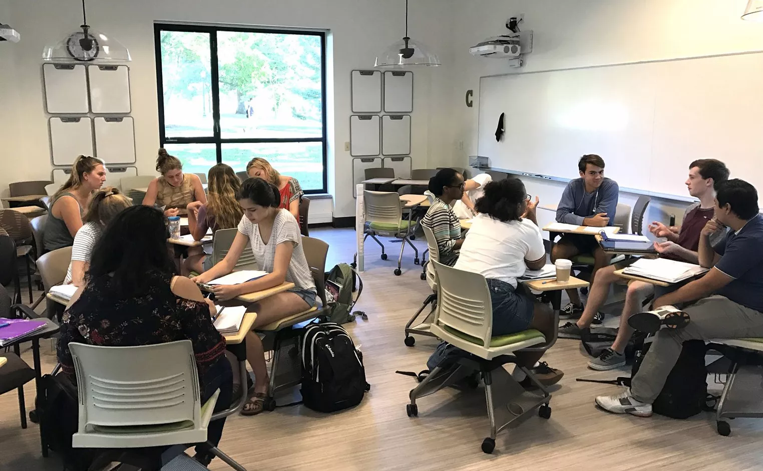 Student in computer lab active learning classroom