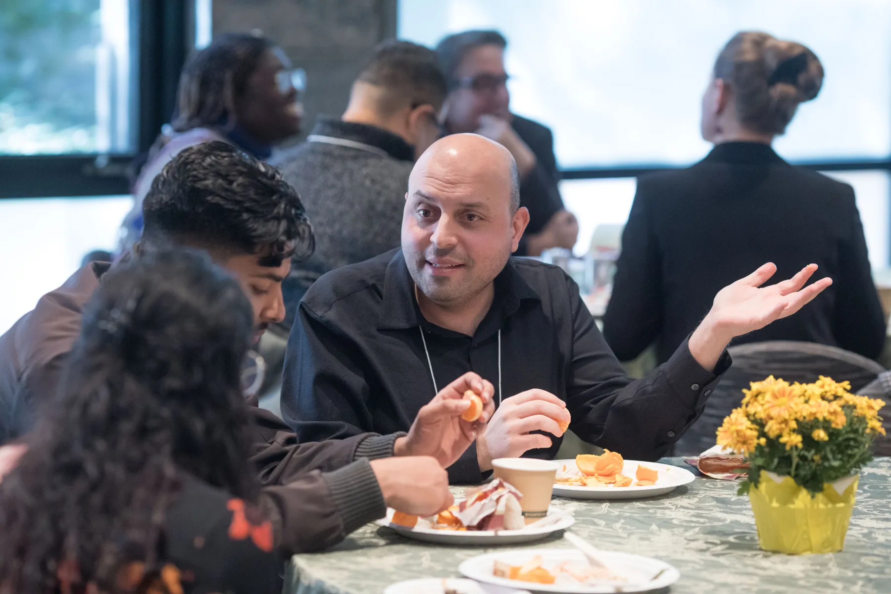 Prof. Atshan speaking with two 2020 Mellon Mays fellows.