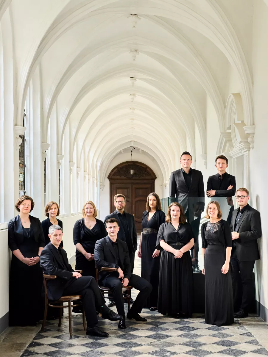 twelve members of Stile Antico posing 