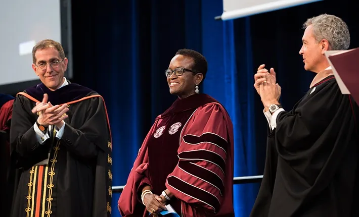 From left, Princeton President Christopher Eisgruber, Valerie Smith, Swarthmore Board Chair Thomas Spock '78 