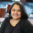 Nafisa Essop Sheik sitting in front of chairs